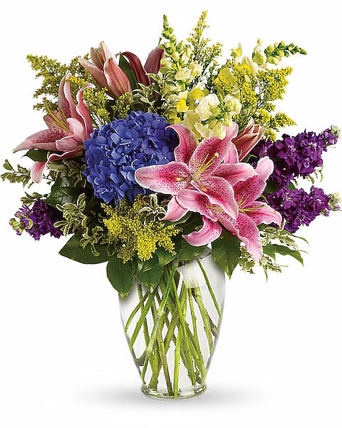 Mixed flowers in clear vase