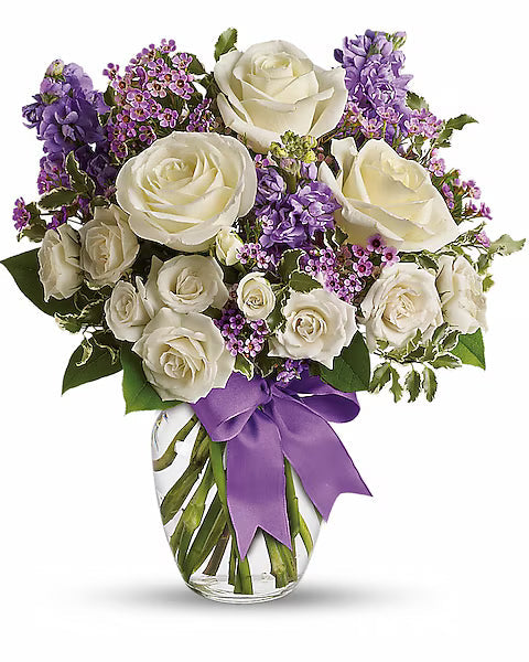Bouquet of white roses and purple flowers