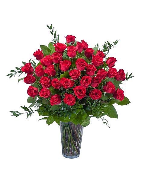 Bouquet of red roses in a glass vase 